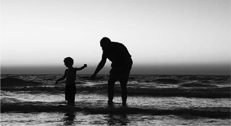 father and son at the beach in jerusalem